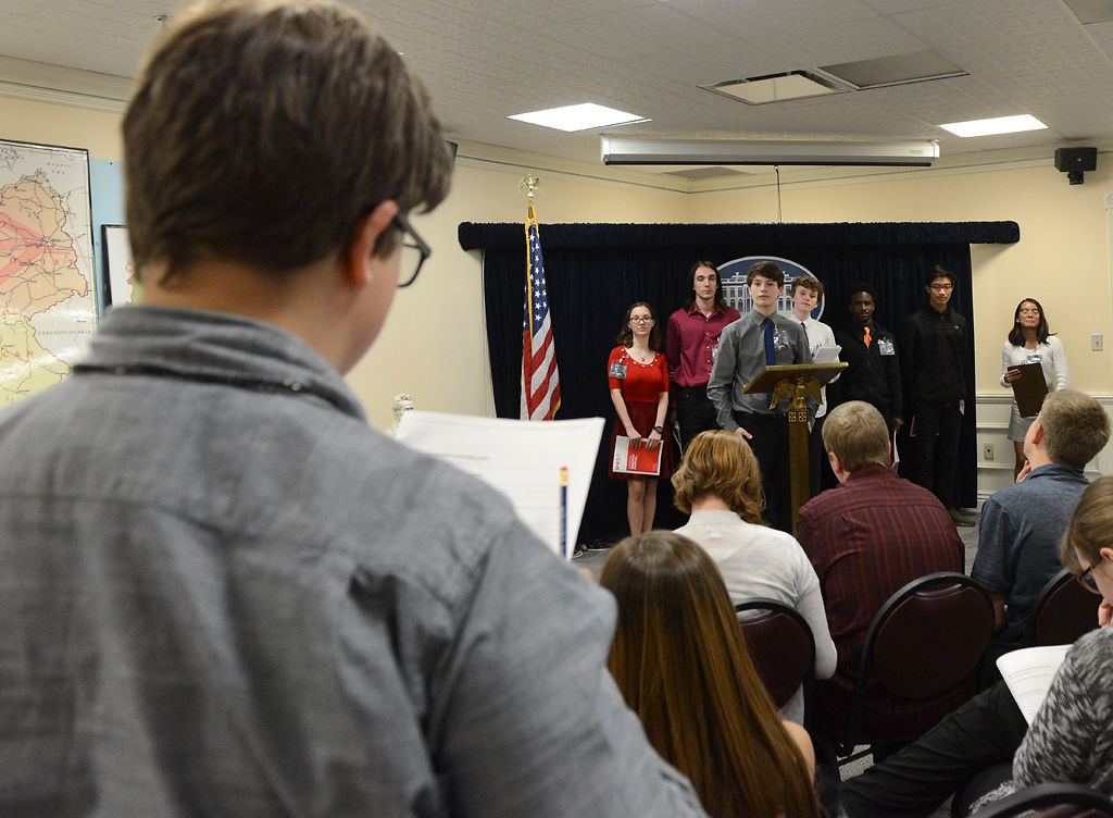 Alex Klinzman answers a question at the final press conference